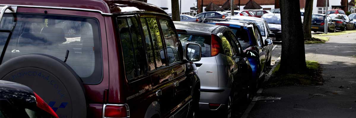 Cars parked close to the QEHB site